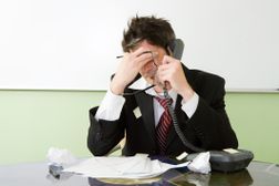 a business man looking stressed