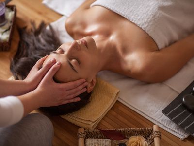 Woman receiving massage therapy for anxiety