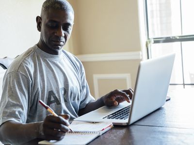 Man using laptop for retirement planning
