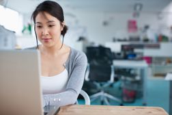 woman on computer in office