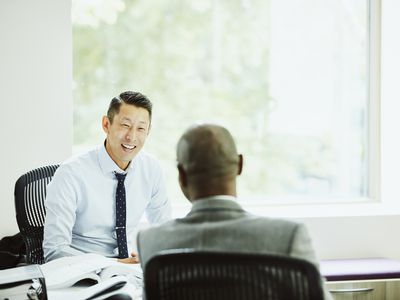 Smiling businessman in discussion