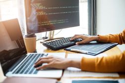 Man Using Laptop On Table