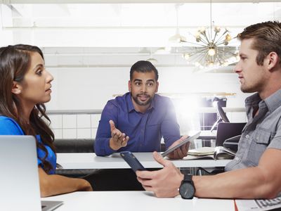 Mediator sitting between a man and woman