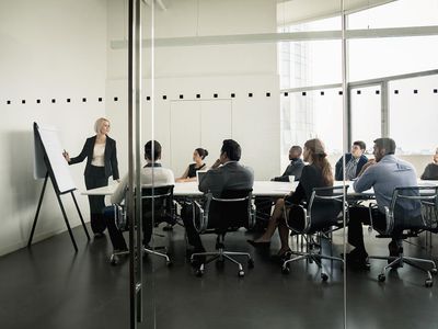 Businesswoman presenting in front of a group