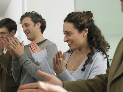 people clapping at work