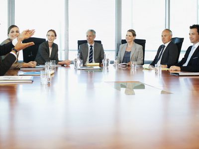 Project board meeting in a conference room