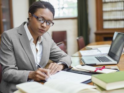 Lawyer taking notes in chambers