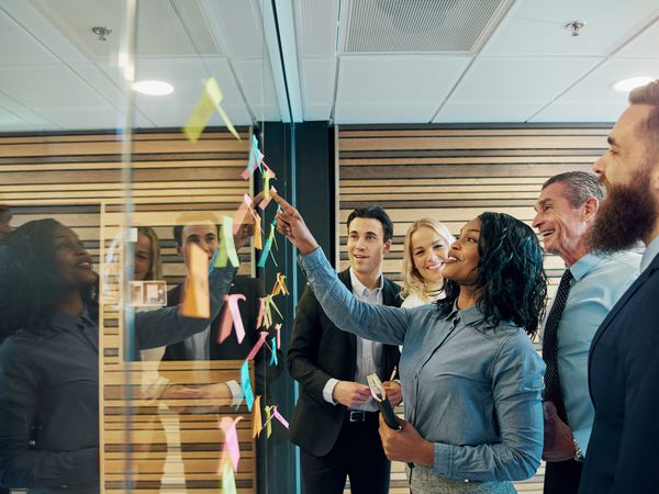 Cheerful entrepreneur team talking in the office
