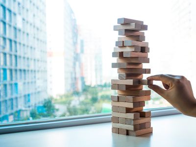 Taking one block from wooden blocks tower
