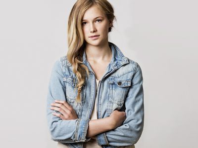 young blonde woman posing casually