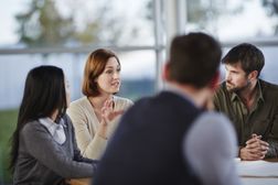 Business people talking in meeting