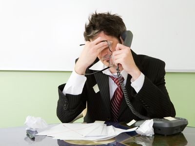 a business man looking stressed