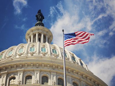 US Capital dome exterior with American flag