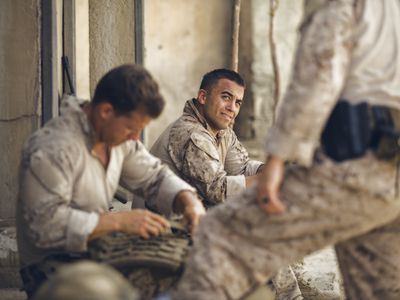 United States Marines relax in combat.