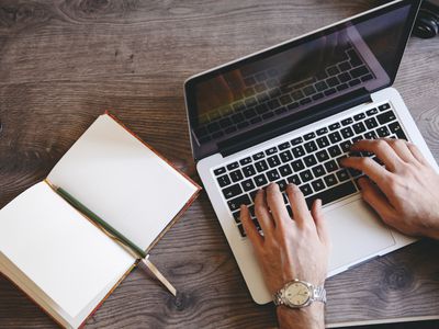 writing on a laptop
