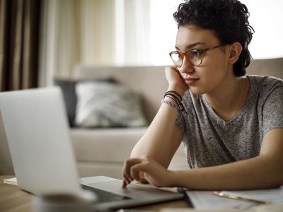 Young woman working at home