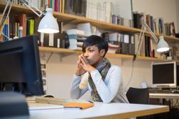 Woman looking at computer