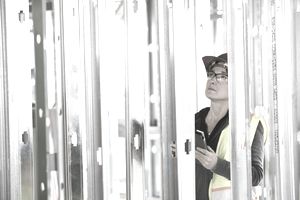 construction worker using digital tablet
