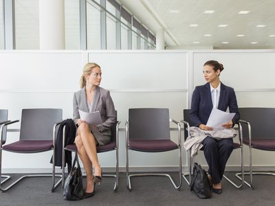 Businesswomen sitting in waiting area