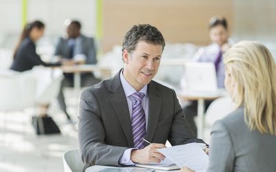 Business people talking in an office