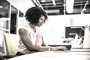 Woman working in modern business office