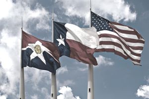 Flags of the City of Dallas, State of Texas and United States of America