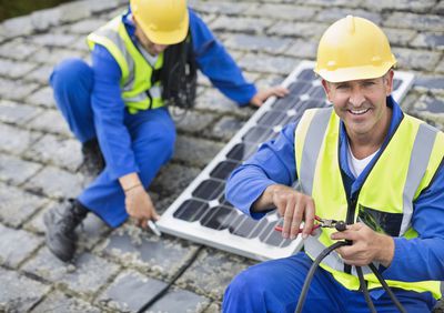 Two solar panel installers