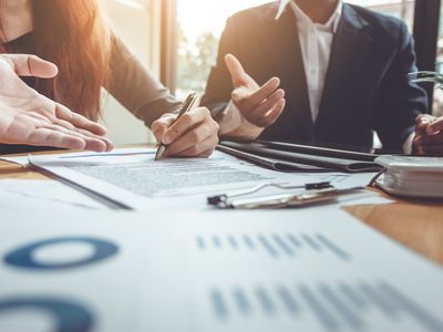 Business Signing a Contract Buy - sell house.