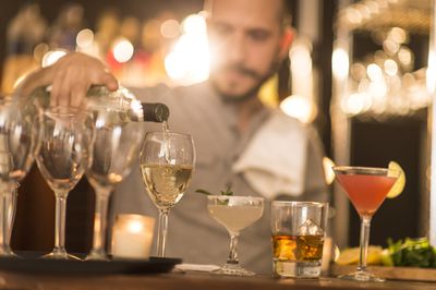 Bartender pouring drinks